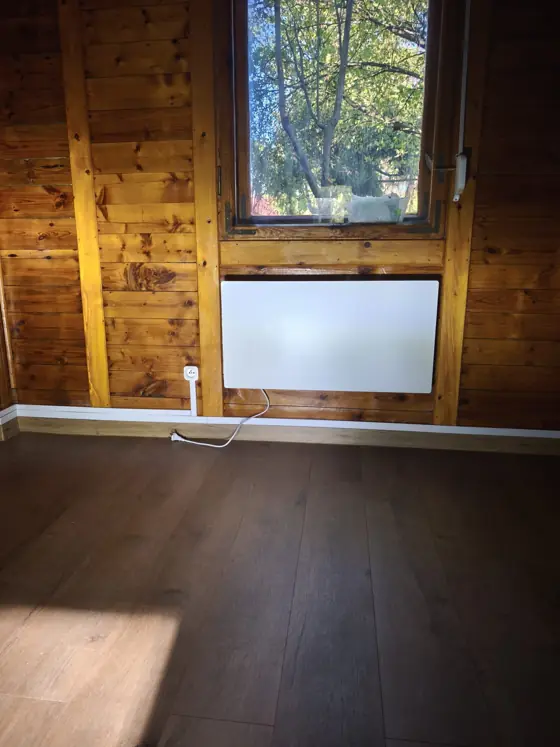 Podłączenie elektrycznego panelu grzewczego w domu drewnianym